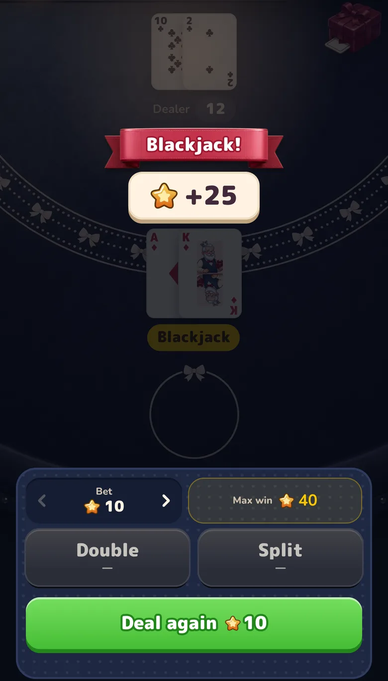 Gift Club blackjack table after a natural: an ace and a king, a Blackjack ribbon and a plus 25 Stars payout on a 10-Star stake