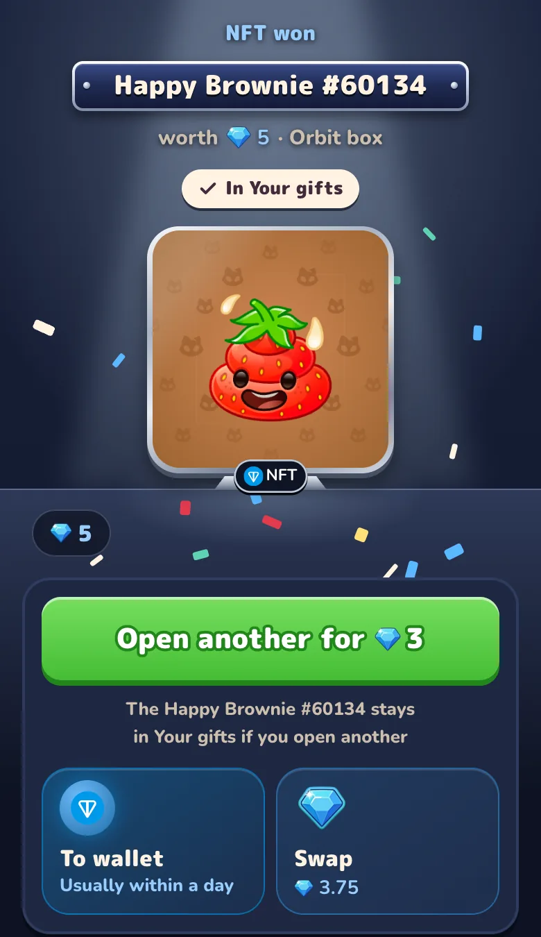 The Orbit box result card: NFT won, Happy Brownie, its Gram value, an In Your gifts tag, and the To wallet and Swap choices under the Open another button